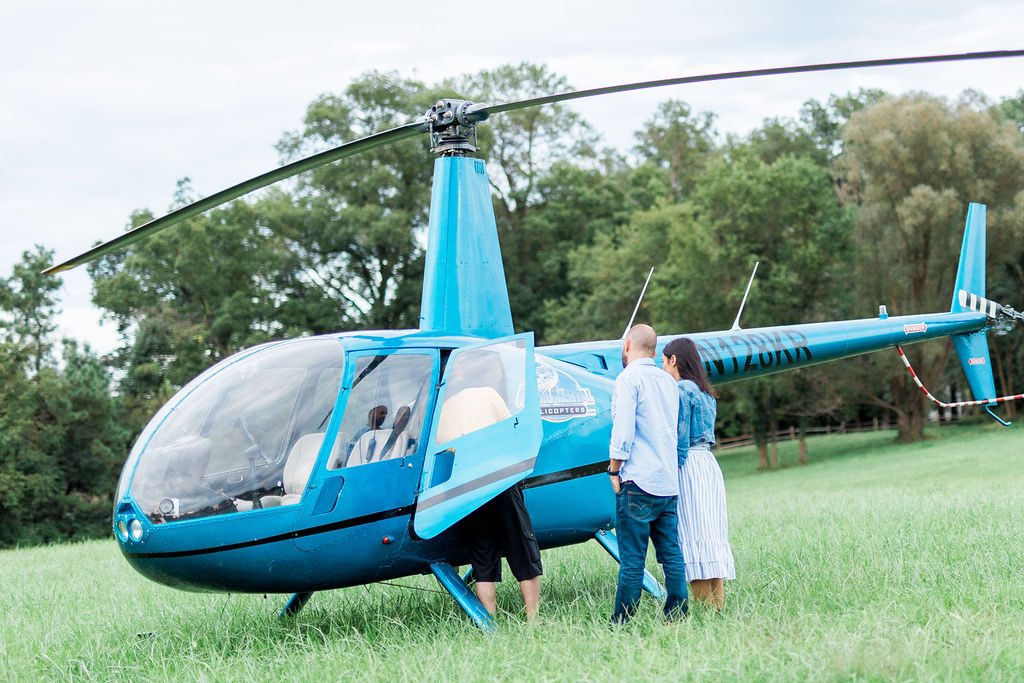 Couple getting in helicopter